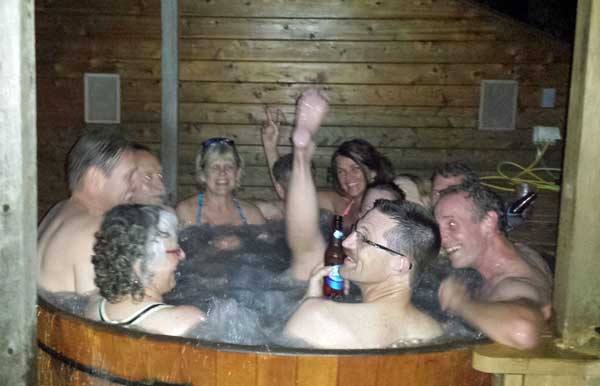 cross country skiers in the hot tub, hydrating and releasing muscle tension