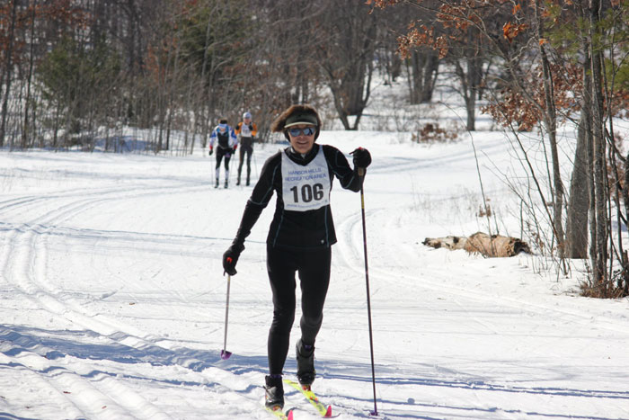 Cross country ski racers on the Hanson Hills Classic race course