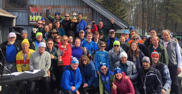 Cross Country Ski Headquarters ski team shows off the Michigan Cup and Brumbaugh Cup