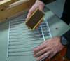 Cleaning Wax Brushes: Brush a wire shelf