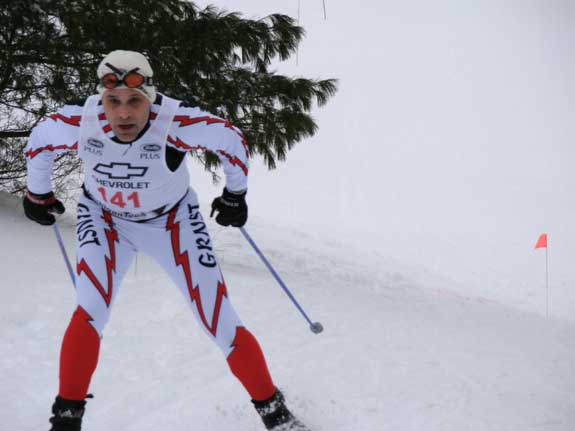 Greg Worsnop is all intensity as he crosses the finish line