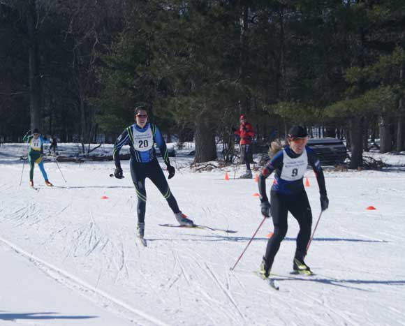 Susan Vigland beats Catarina Gulledge to the finish in the A Final of the Michigan Cup Sprints cross county ski race