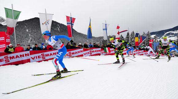 	 Skiers chase each other down in the women's 15k pursuit in stage seven of the Tour de Ski with American Kikkan Randall fifth. (Getty Images/AFP-Giuseppe Cacace)