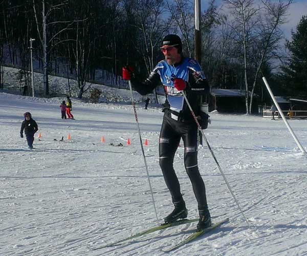 Bill Kaltz of the Team NordicSkiRacer Team "The Snow Surfers" on his way out on a lap.