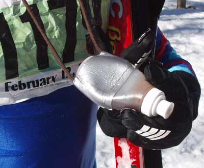 Stuart Picard shows how he attached a Hammer Gel flask to boot string using duct tape.