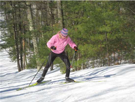 Fran Upton cross country skis up The Wall on the Vasa Trail