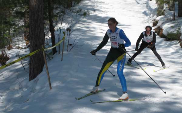 Ann Wagar negotiates the last fast downhill corner at the  2010 Black Mountain Classic cross country ski race