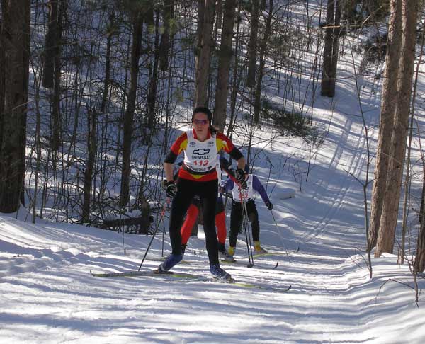 Catarina Gulledge climbs the last big hill at the  2010 Black Mountain Classic cross country ski race