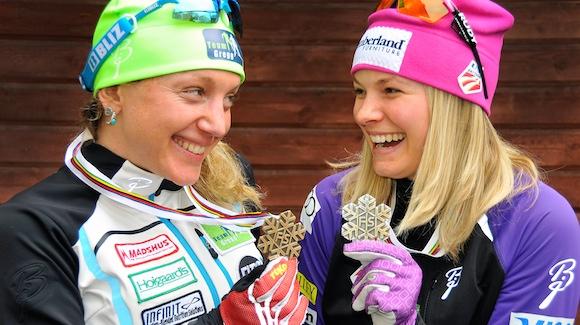 Caitlin Gregg and Jessie Diggins smile at their World Championships medals in 2015. (USSA)