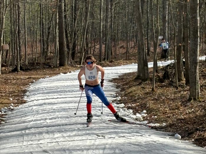 Shirtless cross country ski racer