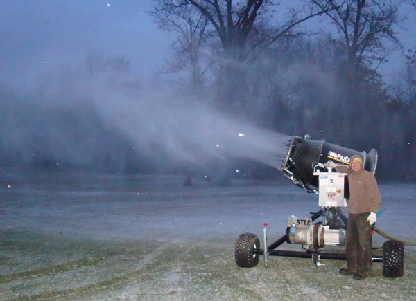 Adam Haberkorn fires up the snow making gun for the first time on Monday night, Jan 2, 2012