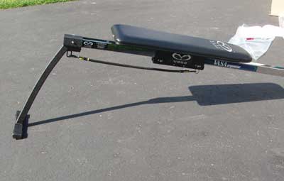 Thrid step for building the Vasa Ergometer: Slide the seat onto the monorail, then attach one of the three tether cords.
