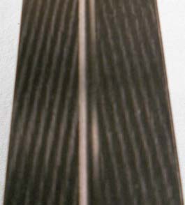 A structured ski: Linear elements organized with an angled pattern.