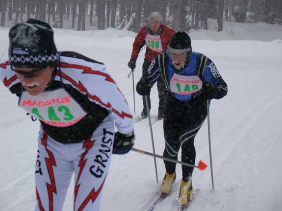 Steve Smigiel Sr tries to hold off Theo VonWallmenich
