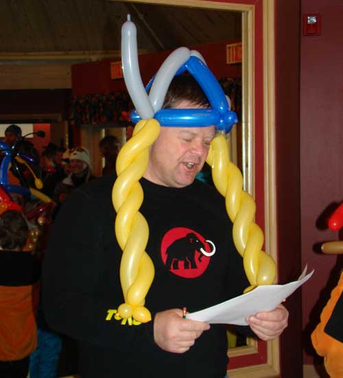 Race Director Nick Baic does his best Heidi impression at the awards Ceremony