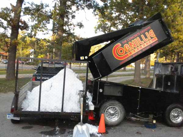Load snow into trailer for Nordic Fest