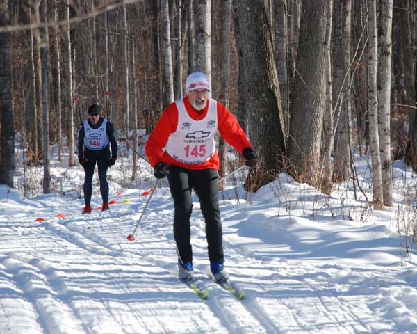 Hap Wright leading John Britton down the hill and into the stadium area