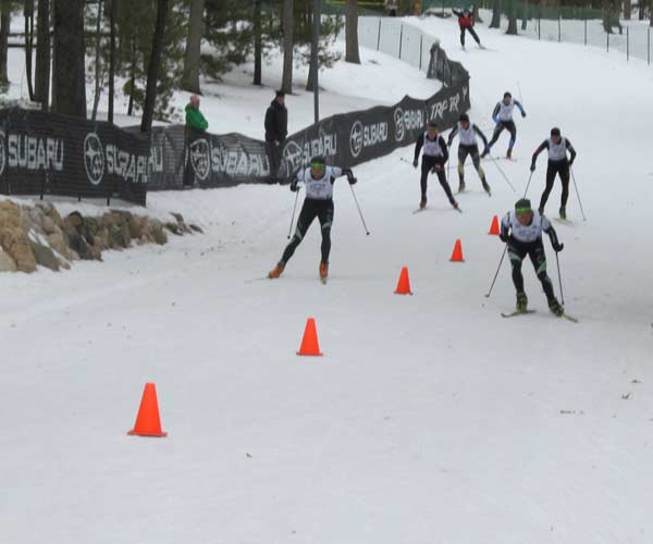 Dan Yankus (left) skis hard to catch Milan Baic