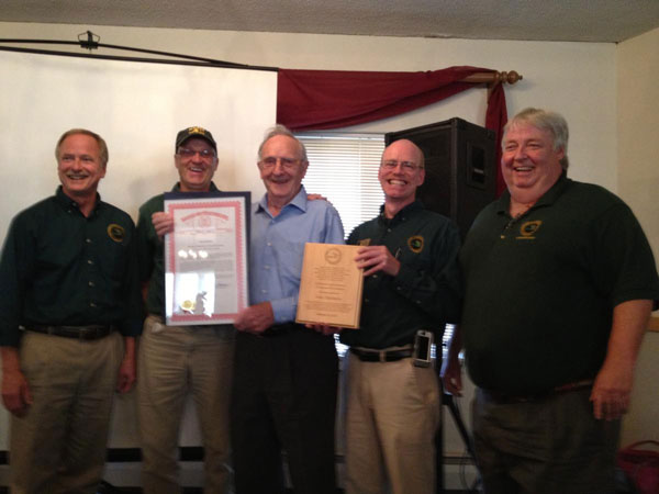 Northern Michigan University Nordic ski coach Sten Fjeldheim received a Partner in Conservation Award from the Natural Resources Commission