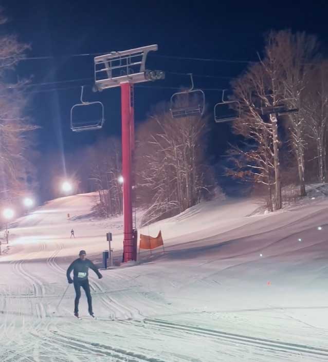 Descending the downhills slopes on cross country ski during the White Pine Stampede