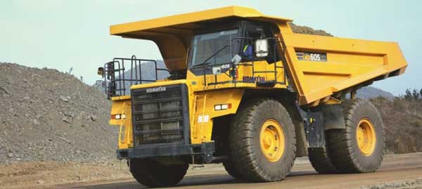 rollerskier pulling dump truck