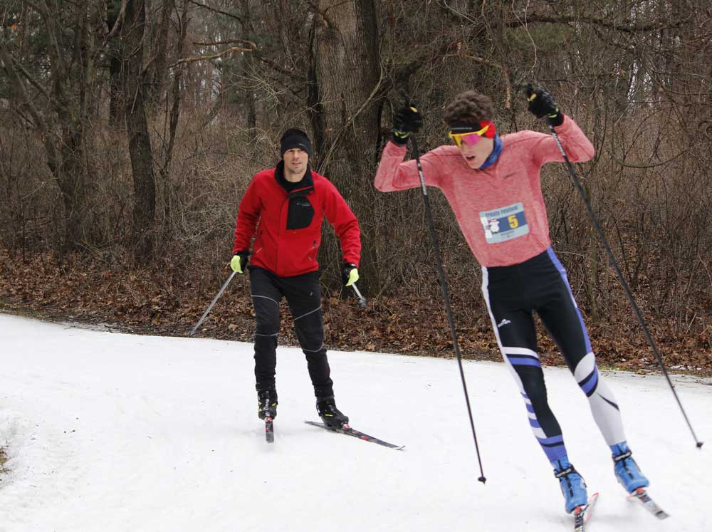 Brad Baas (5) takes no prisoners as he takes a corner at full tilt at the Frosty Freestyle. Photographer: Julie Rascol.