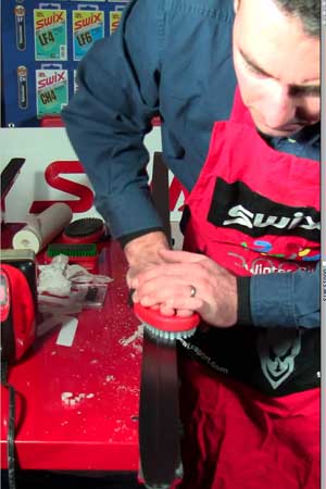 Chris Hall brushing skis