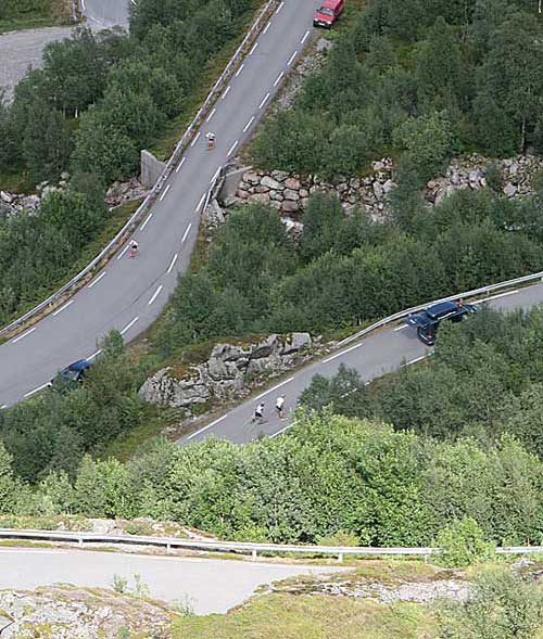 Rollerskiers climbing in Lysebotn