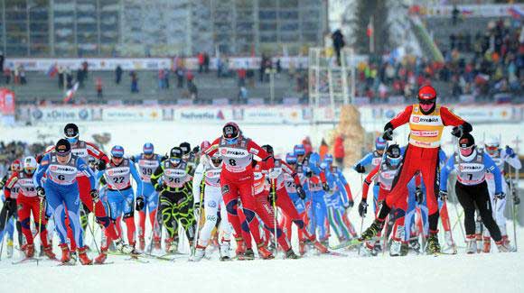 	 A sea of skiers take off in a mass start as the 10k skate gets underway in frigid Rybinsk. Somewhere in the mass of athletes is the U.S. Ski Team's Jessie Diggins, who finished fifth. (Getty Images/AFP-Natalia Kolesnikova)