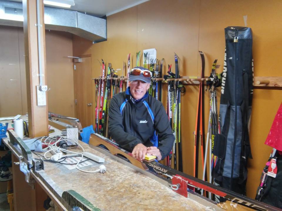 Michael Bourassa waxing xc skis in wax room number 1