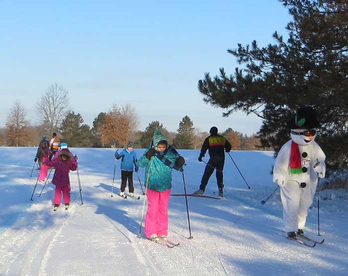 Frosty the snowman watch the Frosty kids cross country ski race
