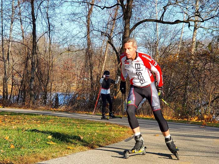 Steve Smigiel Jr and Jolene Ng rollerskiing to the finish