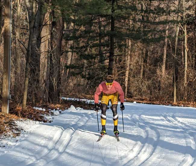 Brad Baas doublepoling between classic tracks