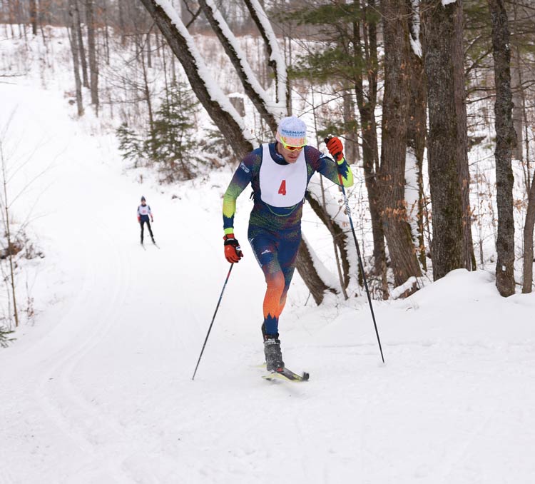 Jorden Wakeley diagonal striding up the hill