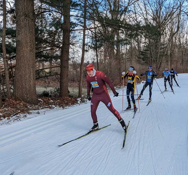 Sarah Duclos in the pack chashing Brad Baas