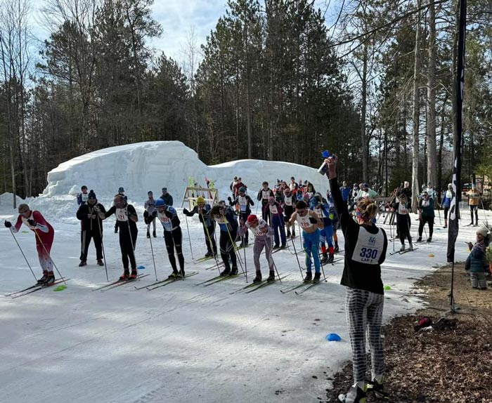 Start of the first leg at the 2024 Michigan Cup Relays