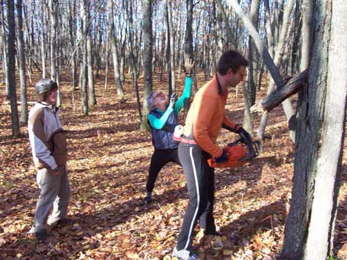 Glen Goodman with a Chainsaw out on Hanson Hill's cross country ski trails
