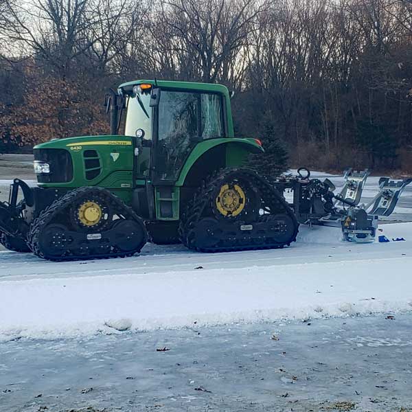 Mueller Tornado powertiller attached to grooming tracker