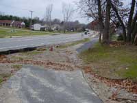 Gravel then a street crossing on the downhill, north out of Lyon Park.
