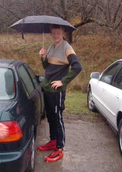 Frank Lundeen standing in the mud at the Ste. Cecile de Masham rollerskiing championships - definitely not skiing!