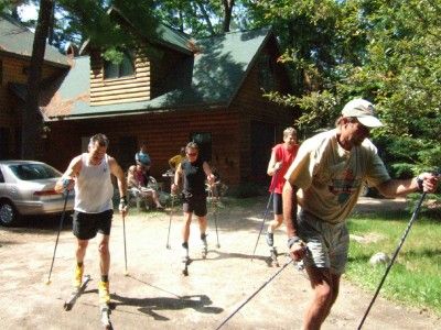 Members of the XCHQ cross country ski team head out on their CAT skis